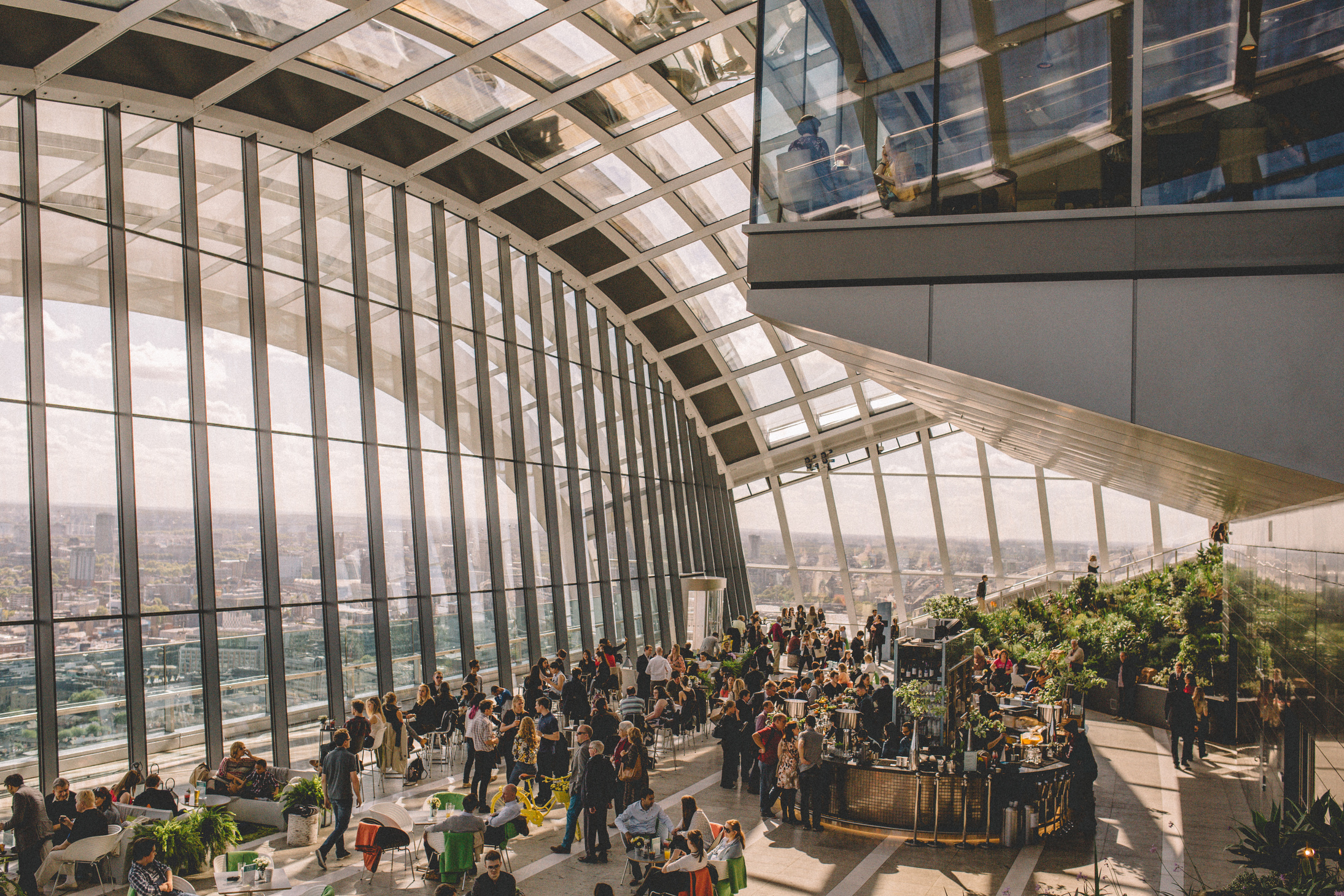 People Inside Glass Dome Building